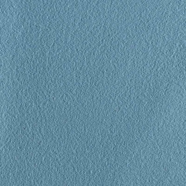 Muted blue-teal plain fabric with a softly pebbled, tactile surface