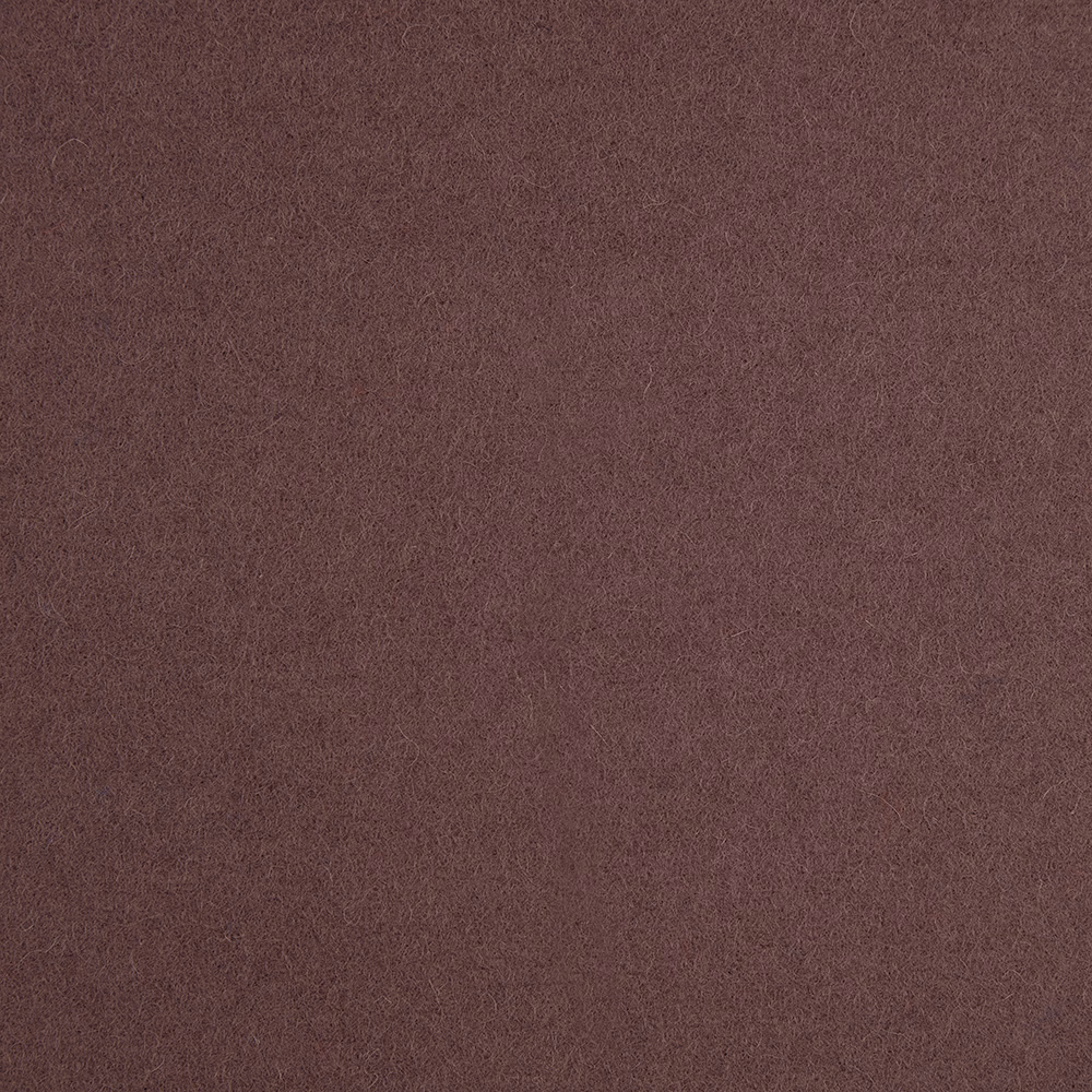 Close-up of muted aubergine fabric with a fine, softly mottled texture