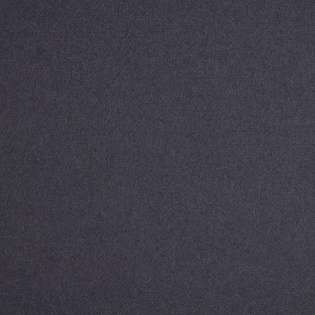 Deep charcoal-grey fabric swatch with fine cloudy mottling and a softly brushed surface