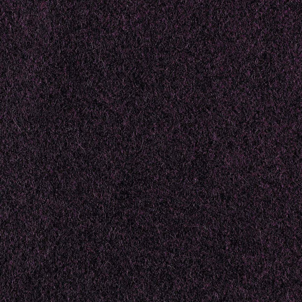 Close-up of dense near-black aubergine fabric with a softly nubby mottled texture