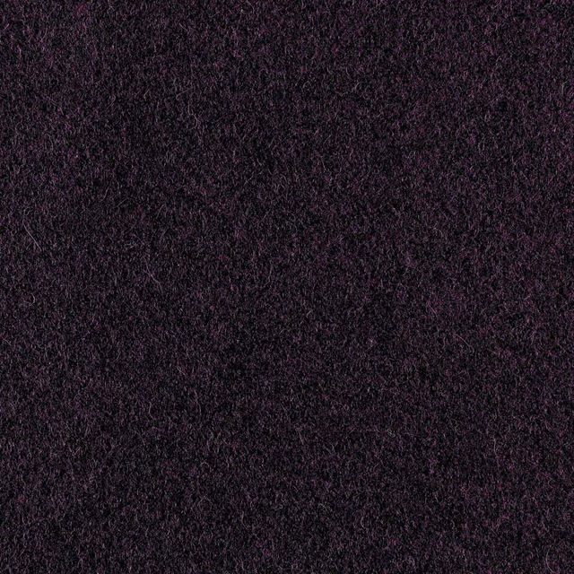 Close-up of dense near-black aubergine fabric with a softly nubby mottled texture