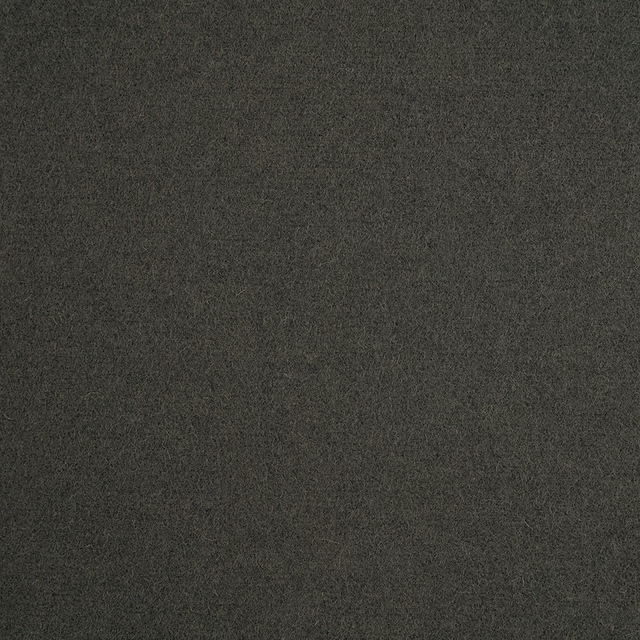 Dark forest-green textile with a fine, charcoal-mottled woven surface