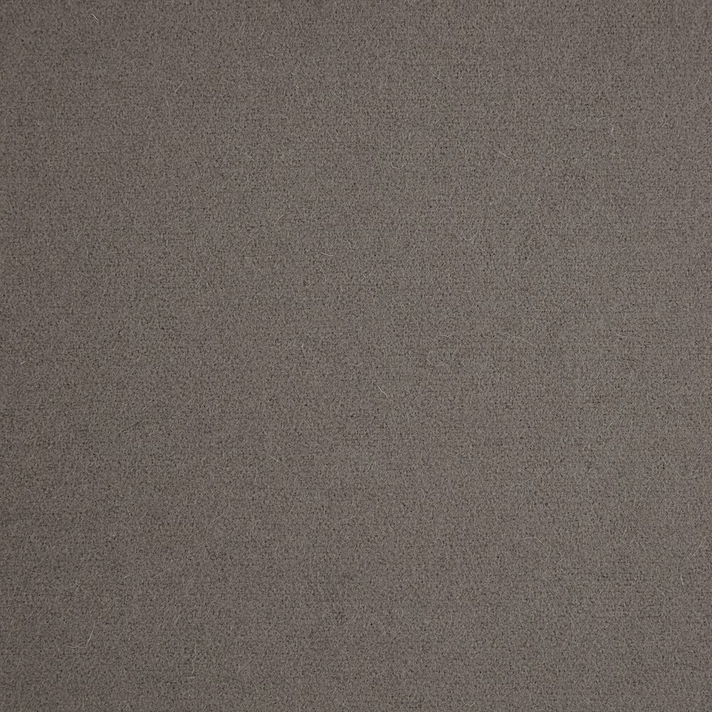 Close-up of softly mottled warm grey textile with a fine-grained surface