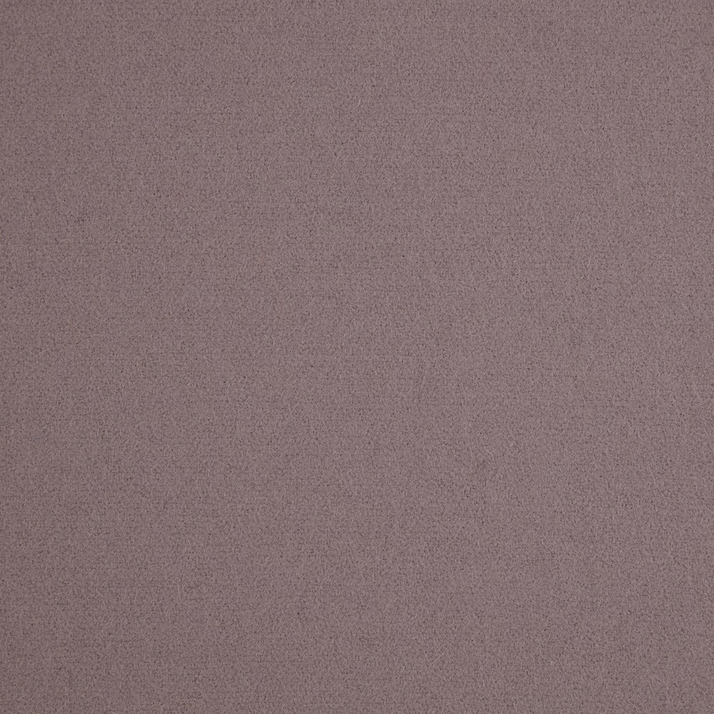 Close-up of finely textured plain fabric in muted dusty lilac mauve