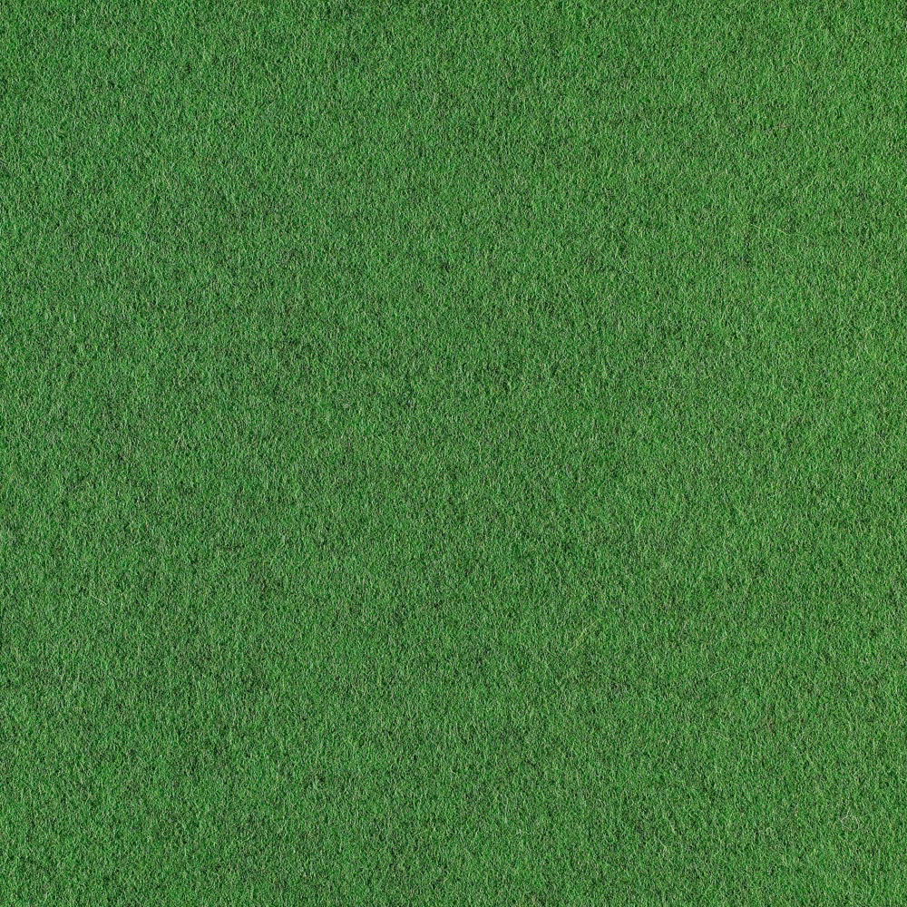 Mottled grass-green fabric with a dense short-textured surface and subtle darker flecks