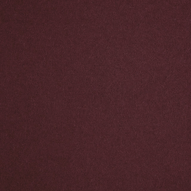 Deep plum textile with a softly mottled, low-sheen fibrous surface