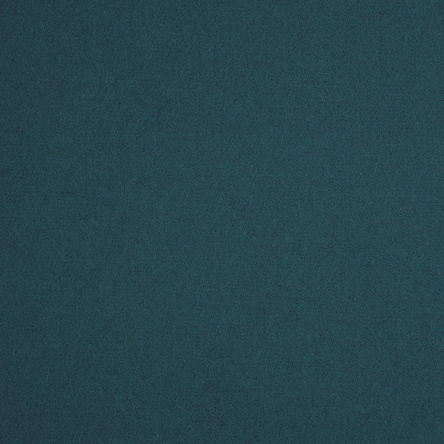 Deep blue-teal fabric swatch with a fine, softly mottled texture