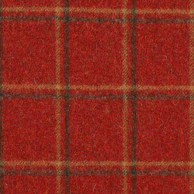 Deep claret-red plaid with dark windowpane lines and a fuzzy woven surface