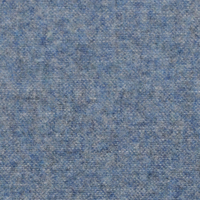 Close-up of mottled steel blue and grey woven fabric with a softly flecked texture