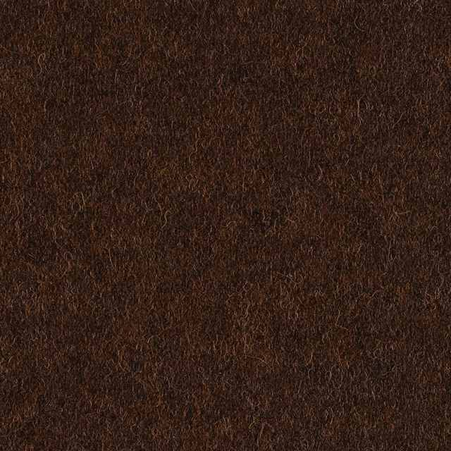 Close-up of dark tobacco brown fabric with dense curly, tactile fibres