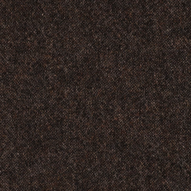 Close-up of deep vintage brown fabric with a fine, irregular mottled weave