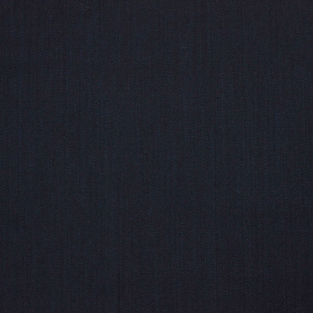Dark charcoal-blue fabric with fine vertical striations and a softly textured surface
