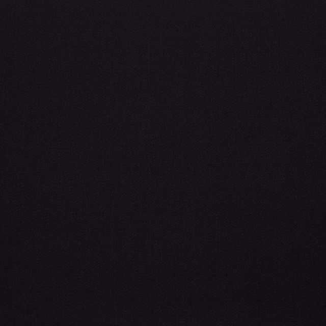 Near-black textile swatch with a barely visible fine, grainy weave