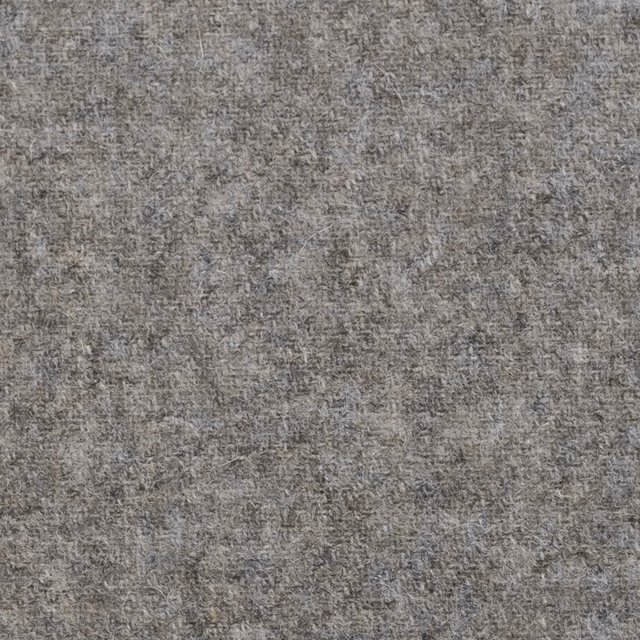 Warm taupe-grey fabric swatch with dense mottled weave and softly brushed texture