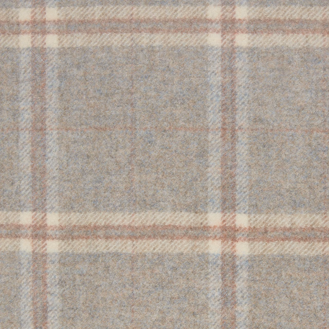 Muted sandstone windowpane fabric with dusty rose and cream lines and a softly brushed weave
