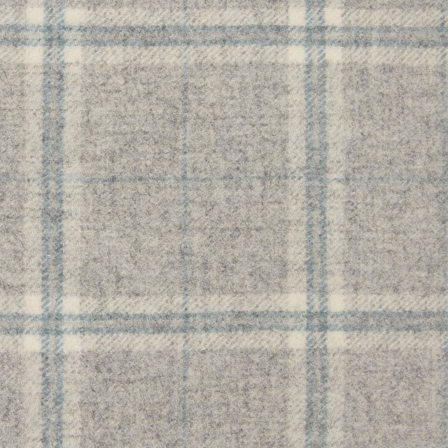 Close-up of cool slate-grey windowpane checks with a soft, brushed-looking woven surface