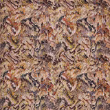 Close-up of zigzag woven fabric in rust, ochre, taupe and black