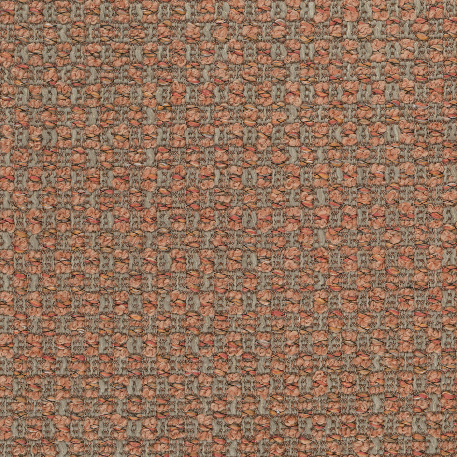 Close-up of a small, nubby terracotta and sage woven upholstery fabric