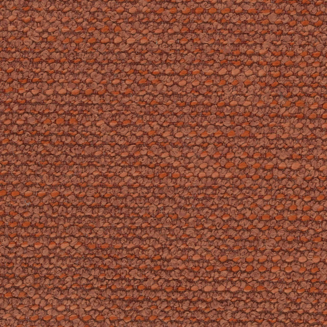 Close-up of textured terracotta bouclé-style fabric with rusty orange flecks