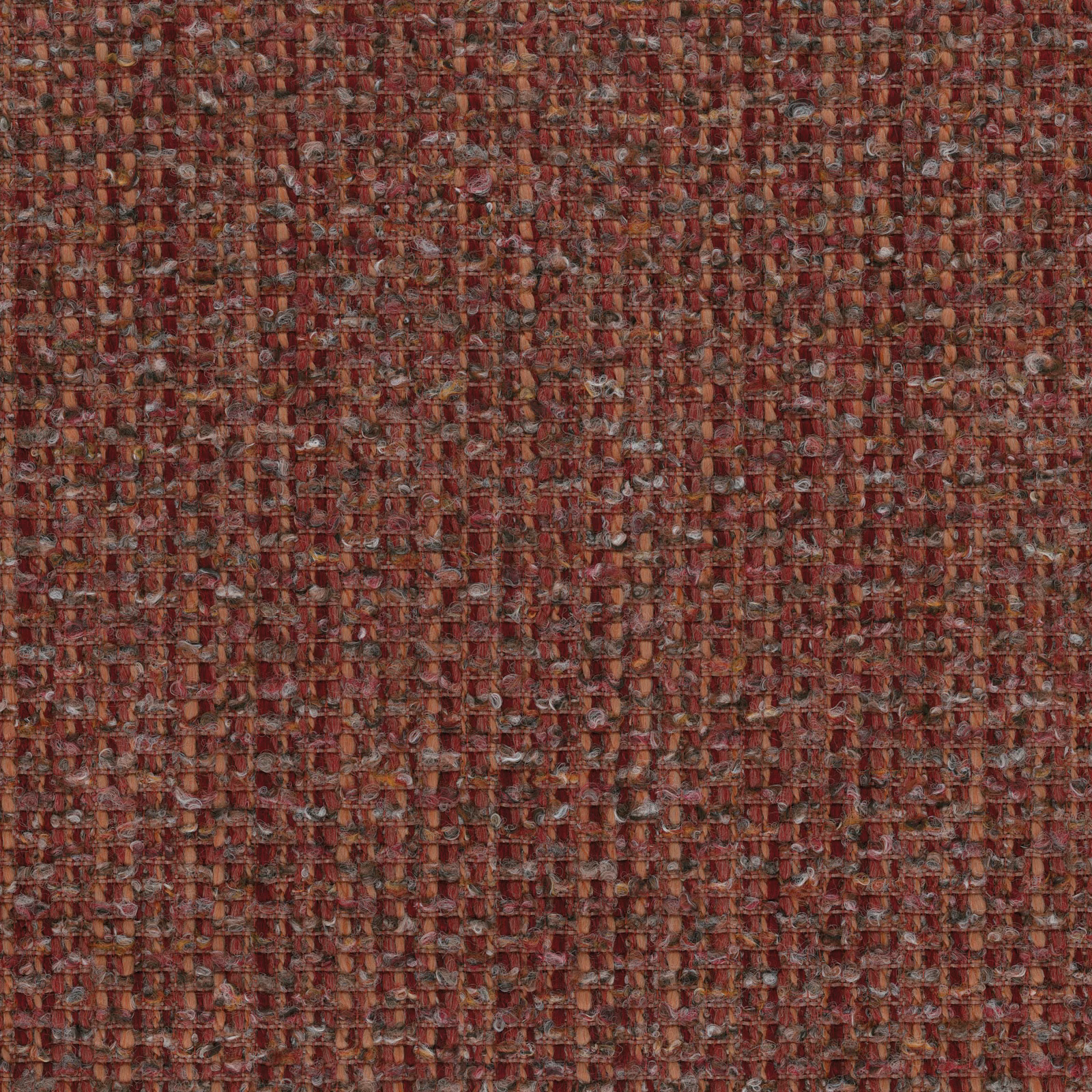 Close-up of rust red tweed upholstery fabric with speckled woven texture