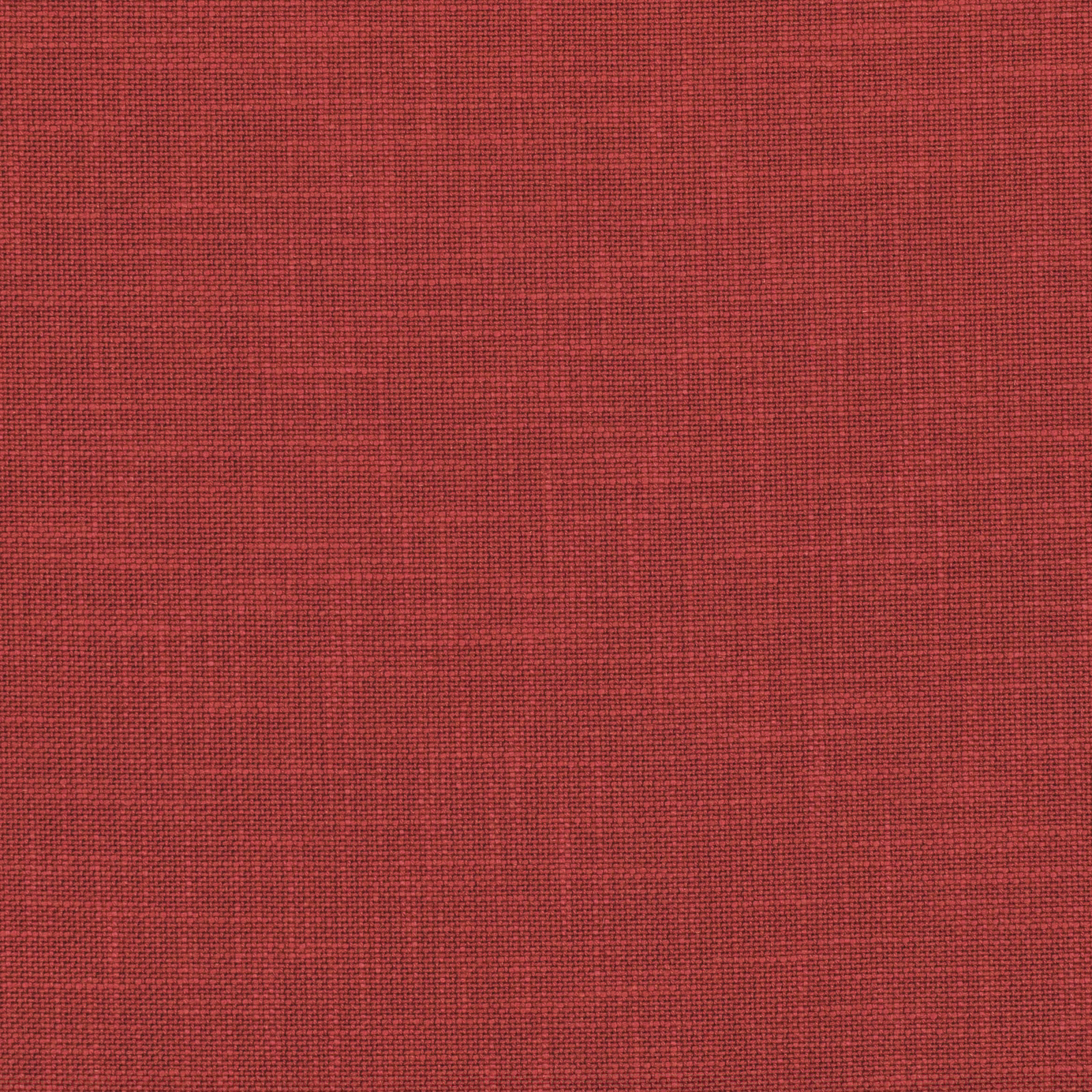 Close-up of warm harissa-red fabric with a fine, tightly woven crosshatch texture