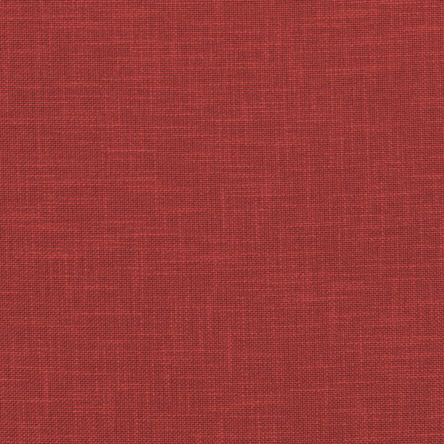 Close-up of warm harissa-red fabric with a fine, tightly woven crosshatch texture
