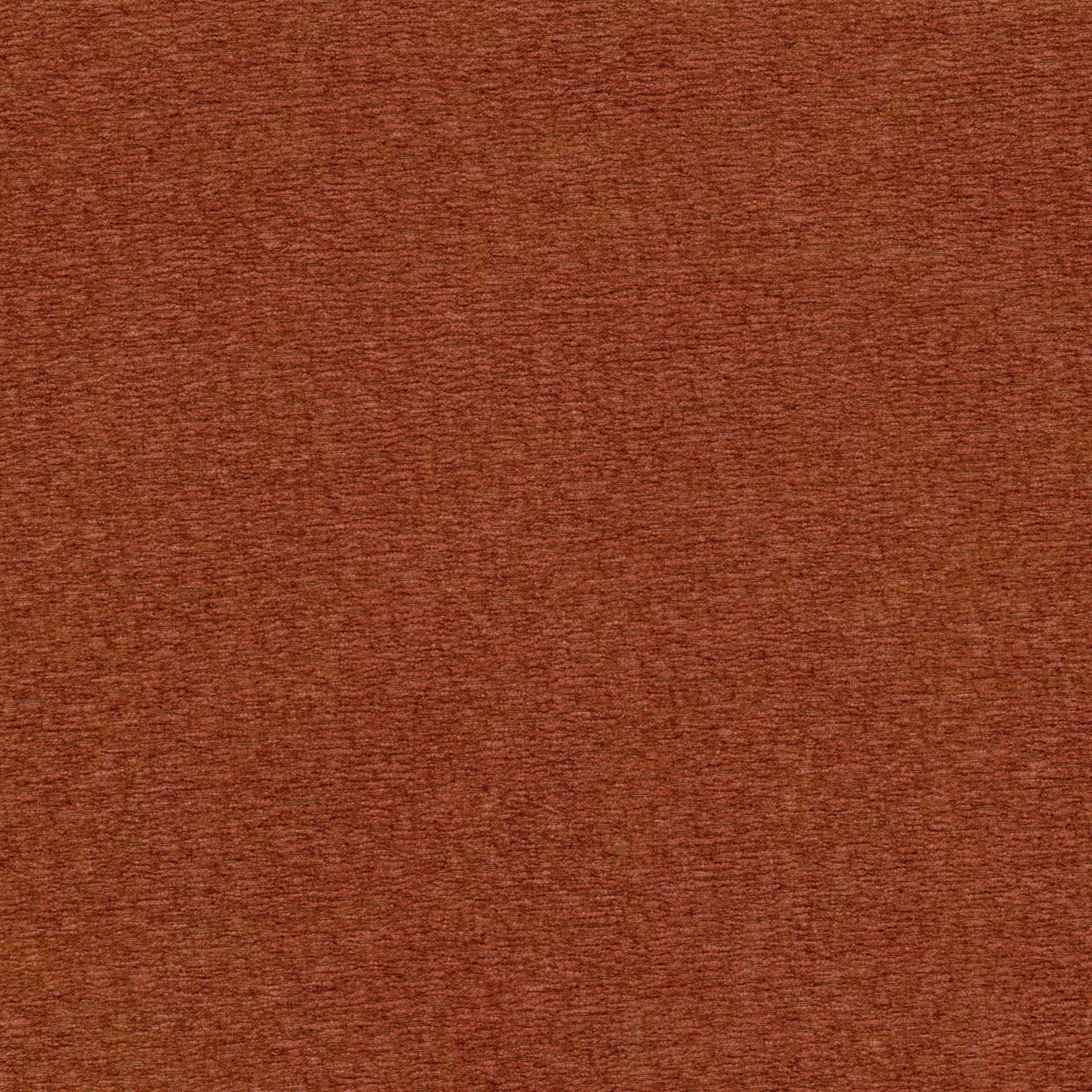 Close-up of burnt sienna woven fabric with fine horizontal slub texture