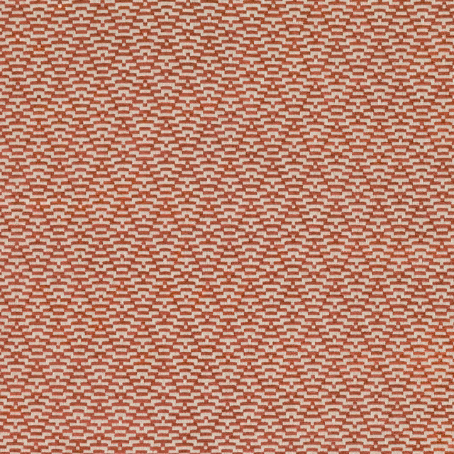 Burnt sienna woven fabric with a small cream stepped geometric pattern