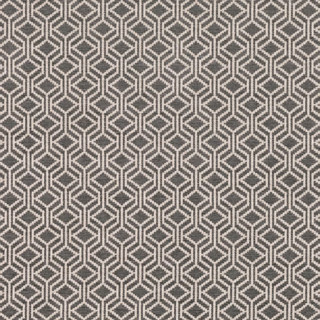 Cool charcoal grey woven fabric with repeating pale interlocking diamond geometry