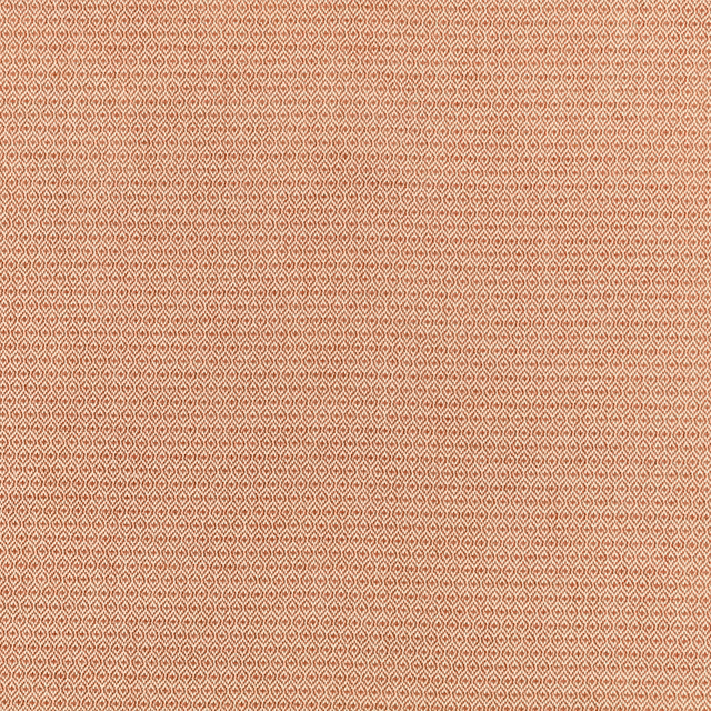 Burnt sienna woven fabric with a fine cream geometric diamond lattice