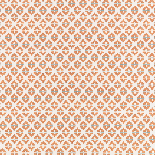 Warm mango-orange and off-white small geometric textile pattern close-up