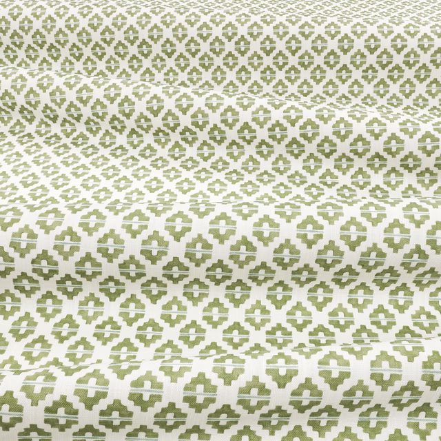 Soft matcha-green and white geometric woven textile with tactile horizontal patterning