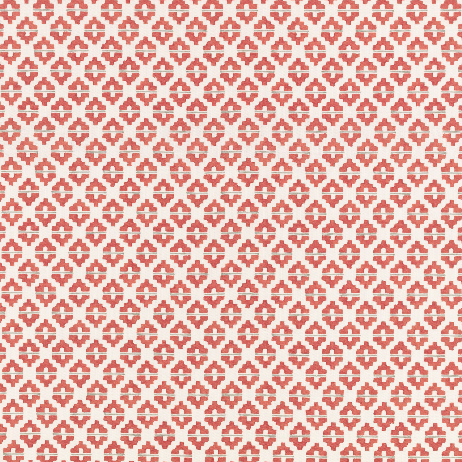Small coral-red geometric motifs repeat across a warm ivory woven ground