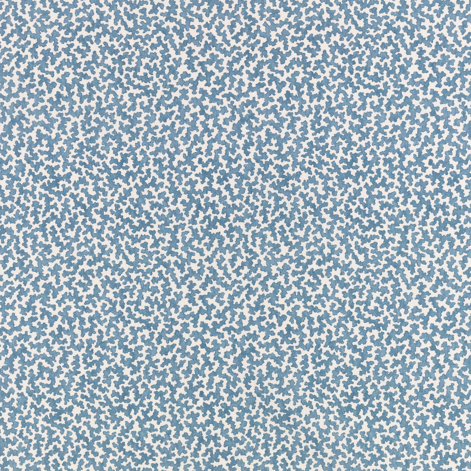 Pale blue fabric densely covered in tiny irregular darker blue flecks