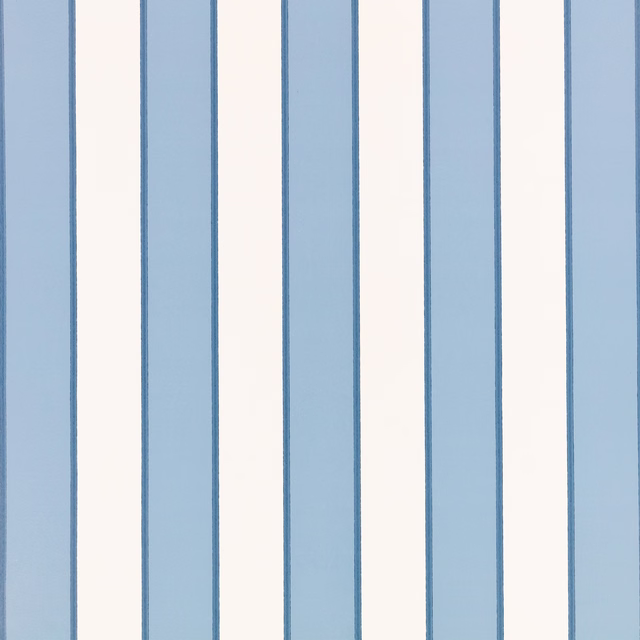 Pale blue and ivory wallpaper with broad vertical stripes and fine blue edging