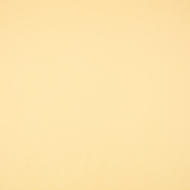 Pale butter-yellow plain weave with a fine, softly textured surface