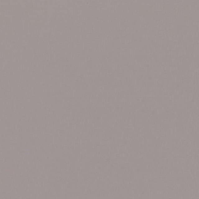 Close-up of plain cool pewter-grey fabric with a fine, even woven texture