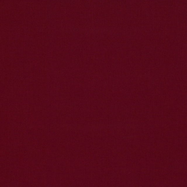Deep burgundy-red plain woven fabric showing a subtle even surface texture