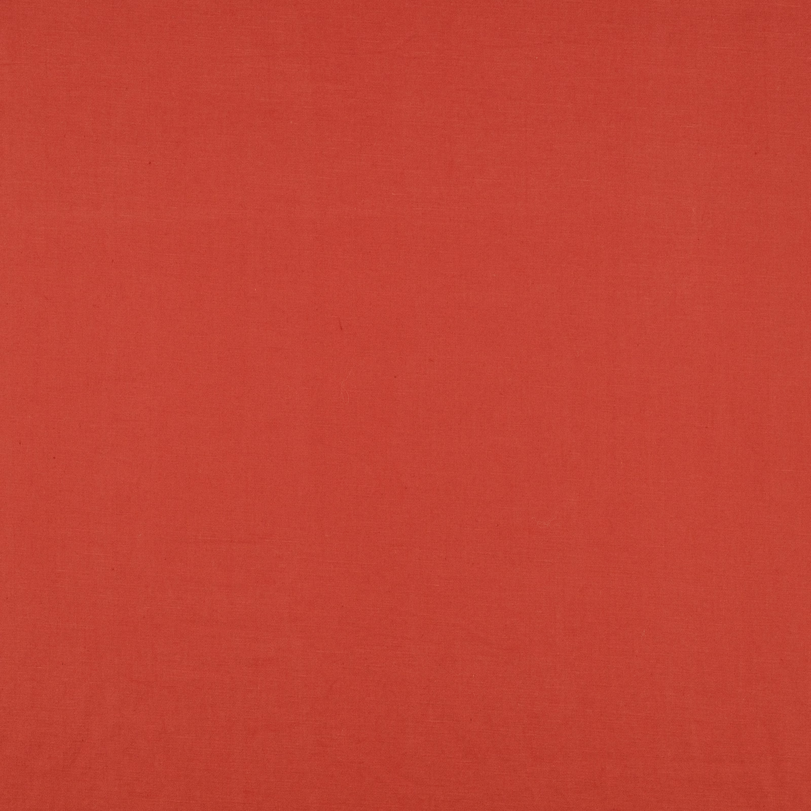 Warm brick-red plain woven fabric with subtle tonal texture across the swatch