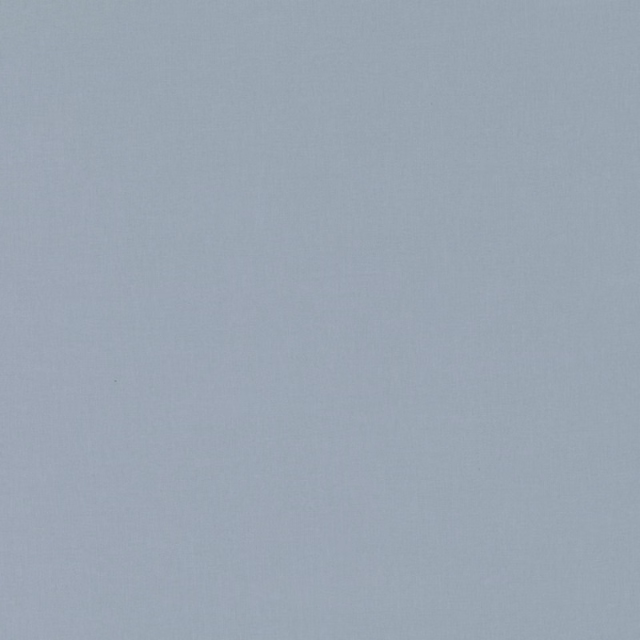 Muted steel-blue plain fabric with a fine, softly mottled woven surface