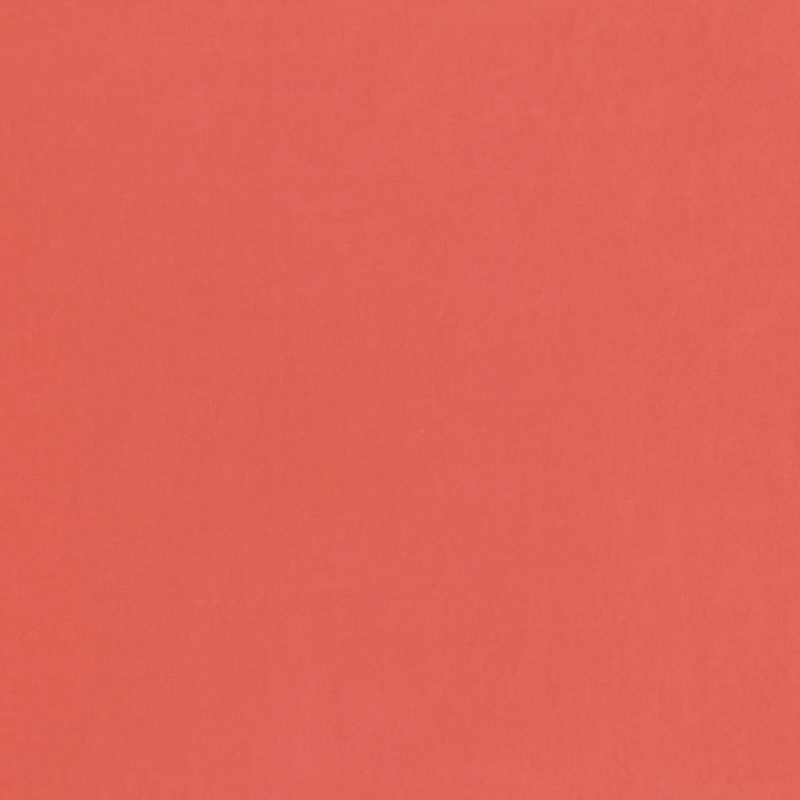 Plain coral terracotta fabric swatch with a softly textured matte surface