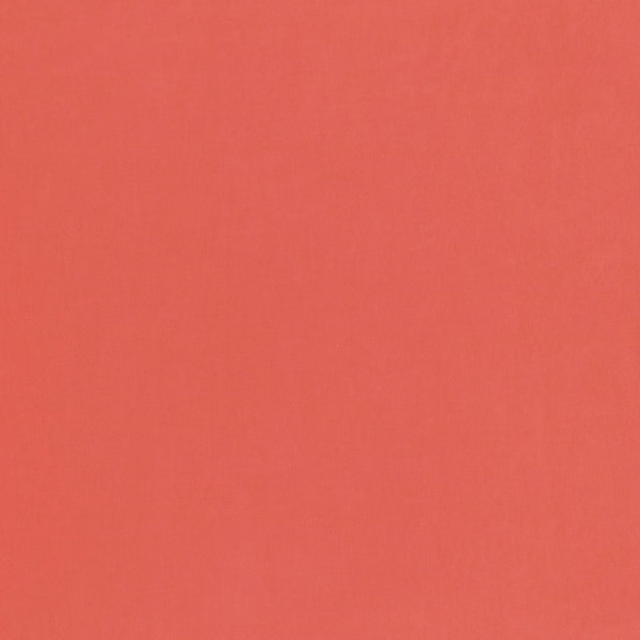 Plain coral terracotta fabric swatch with a softly textured matte surface