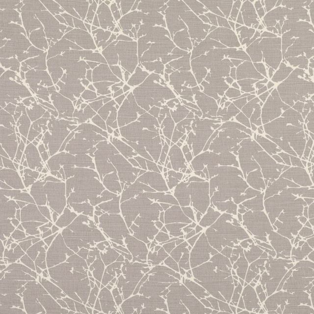 Warm taupe-grey fabric with an all-over cream branching twig motif and woven texture