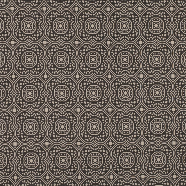 Charcoal textile with cream dotted medallions, curved lattice lines and subtle grain