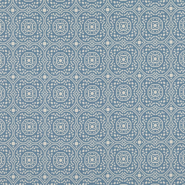 Dusky Oxford blue fabric with ivory dotted medallions in a geometric lattice
