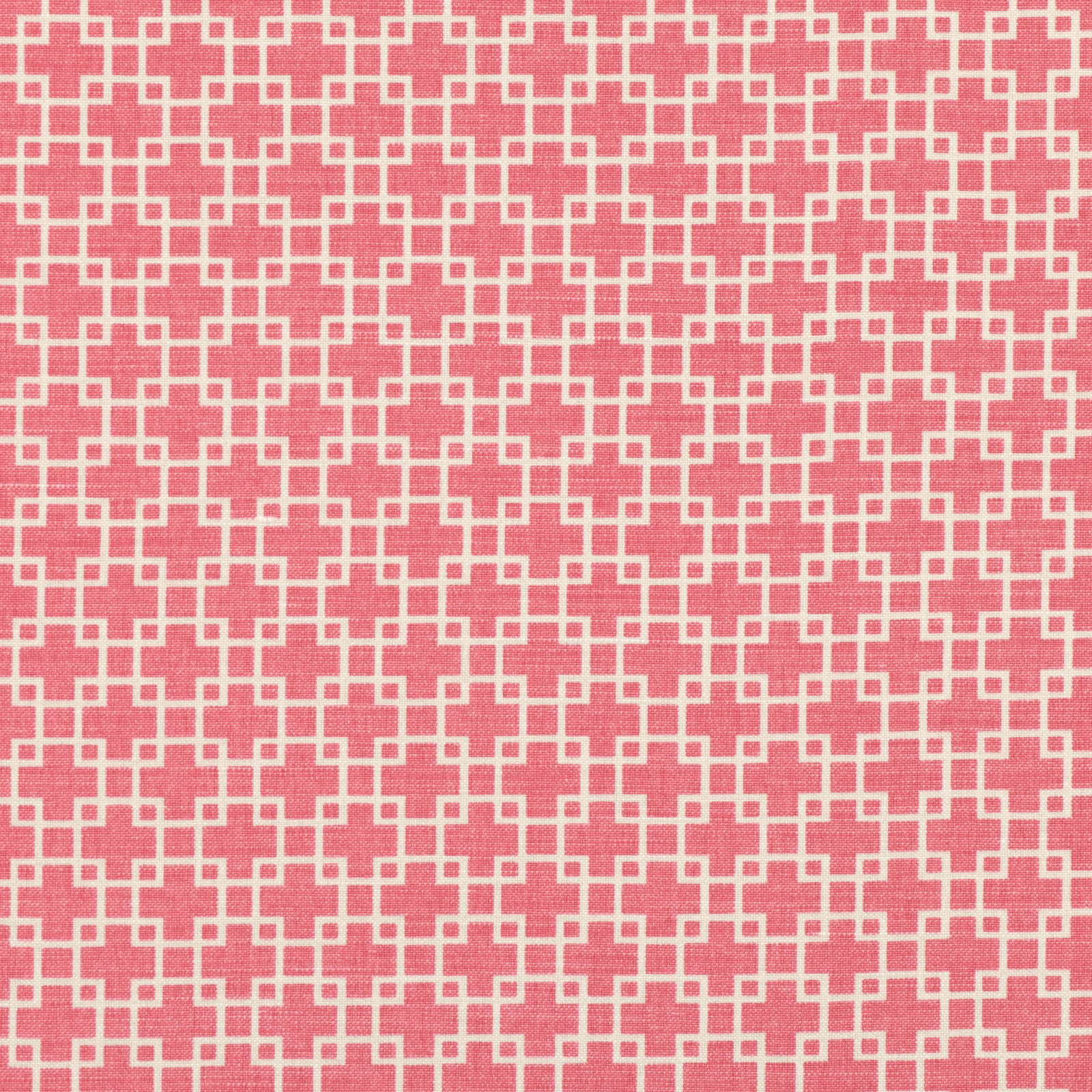 Warm coral-pink textile with a cream interlocking geometric lattice and lightly textured surface