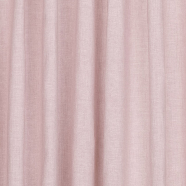 Pale blush pink fabric with subtle fine texture falling in soft vertical folds
