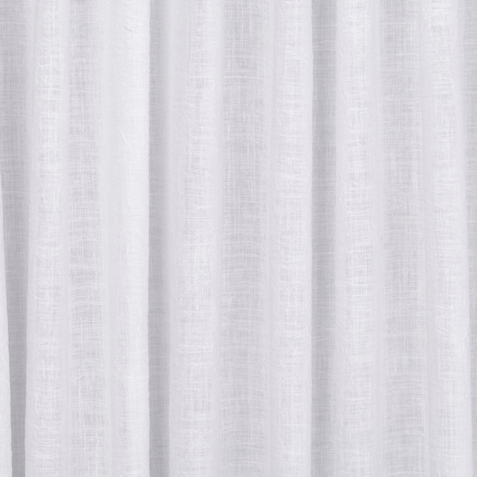 Chalk-white fine weave with subtle slubs falling into soft vertical folds
