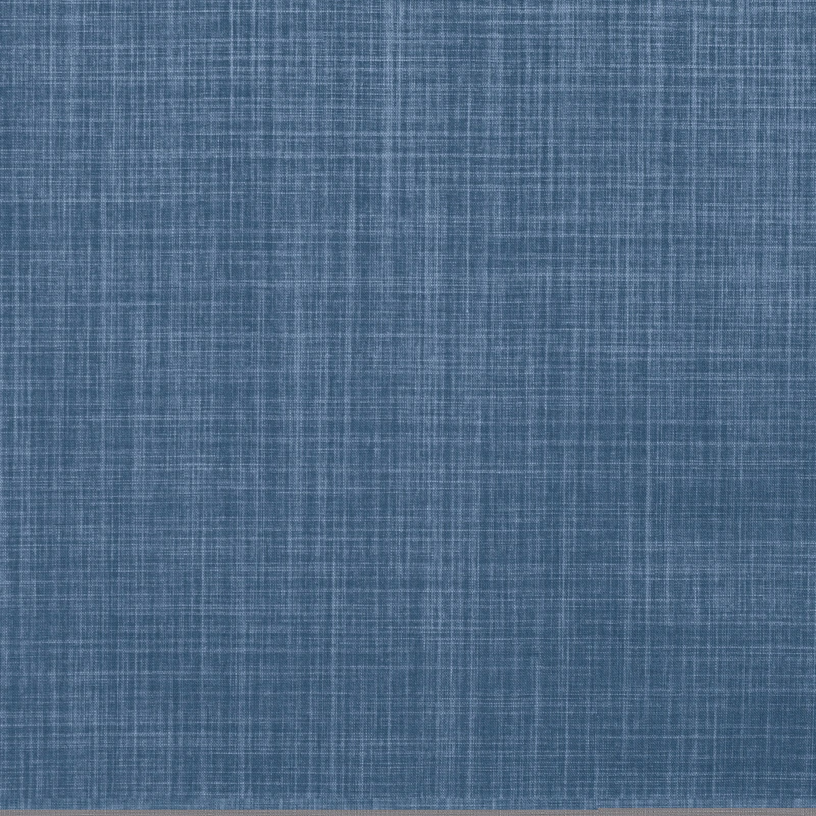 Muted denim-blue fabric swatch with fine woven crosshatch texture
