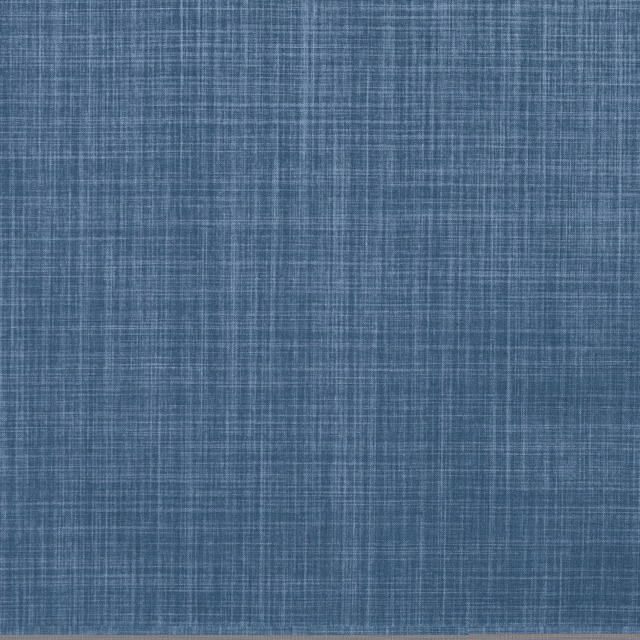 Muted denim-blue fabric swatch with fine woven crosshatch texture